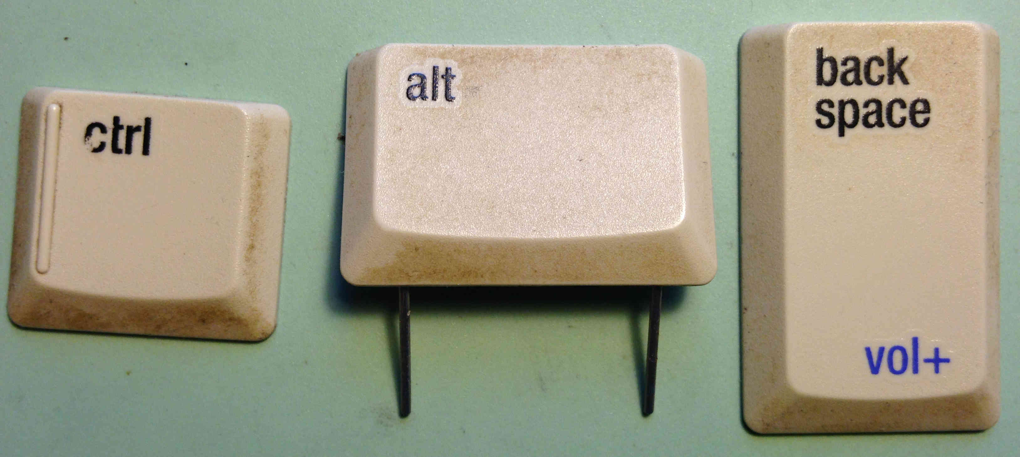 Keys arranged to show Ctrl-Alt-Backspace.
